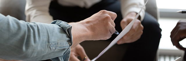 Man reviewing bankruptcy paperwork with a Licensed Insolvency Trustee